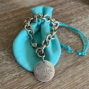 Tiffany & co. classic bracelet with circle charm. Well worn!